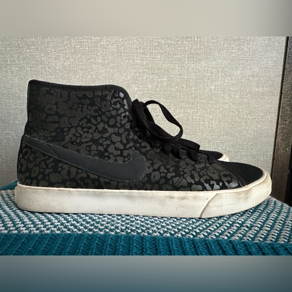 Nike black in black cheetah print high tops.